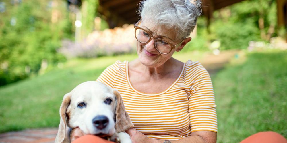 Senior woman with dog